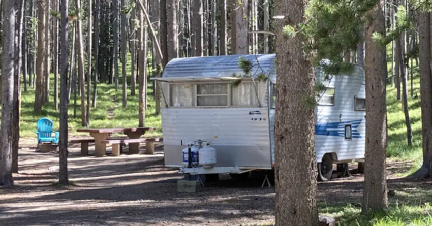 rv in wooded area 850x445