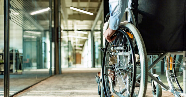 senior in wheelchair 768x402